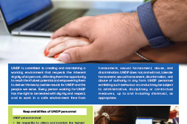 visual of poster showing a male hand over a female hand next to a laptop